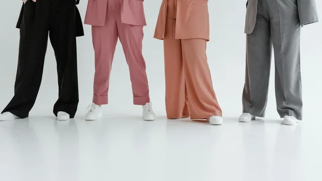 Fashion professionals in stylish suits, EU Circular Economy Act compliance for fashion brands
