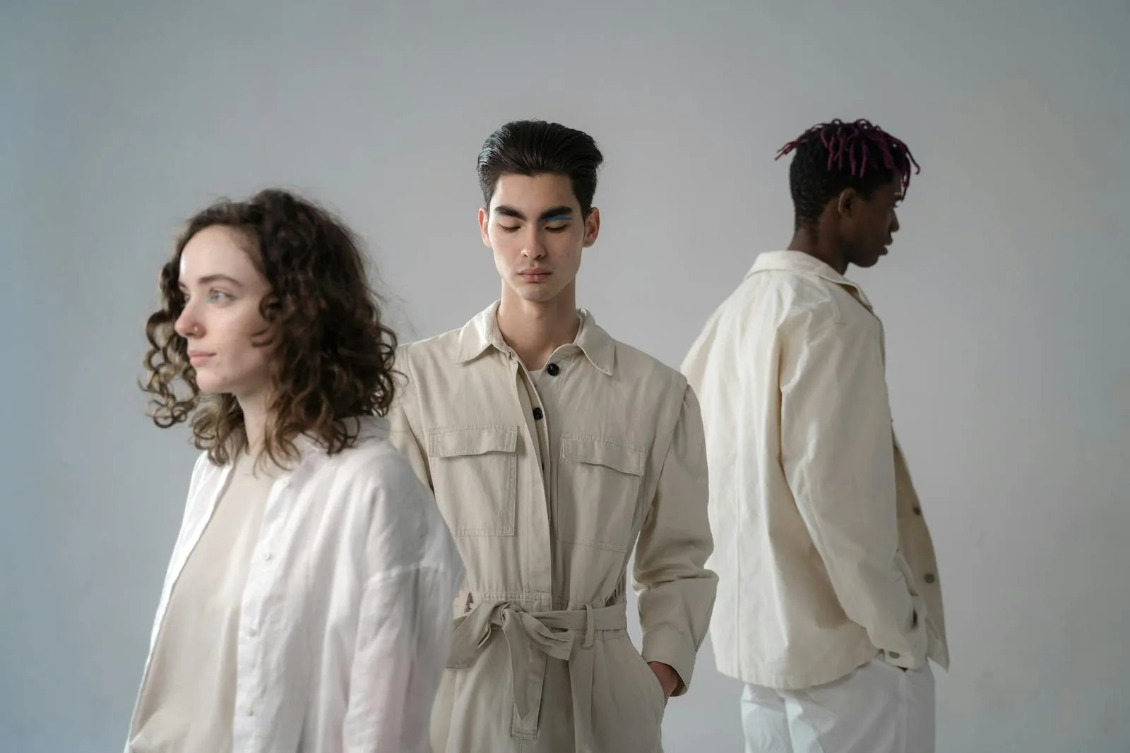 Digital product passport consumer, young adults in stylish neutral outfits during a studio photoshoot