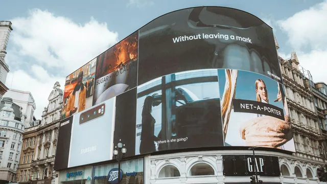 Digital billboards representing how a DPP can be used as a marketing tool for fashion brands