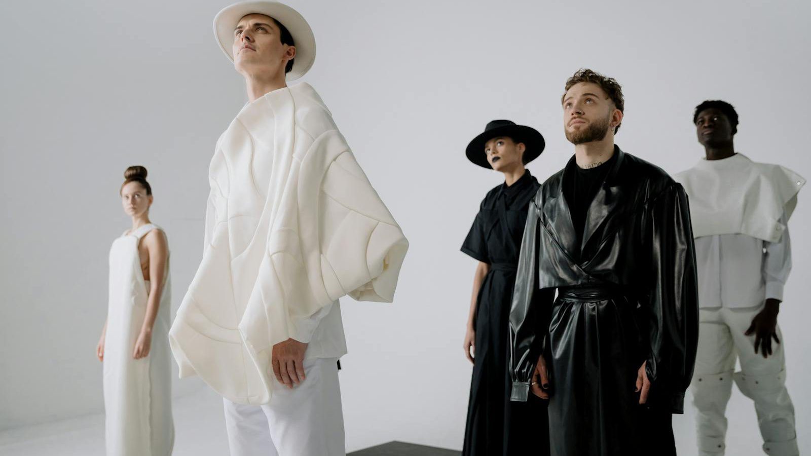 Life cycle assessment fashion — models representing sustainable design in a minimalist studio