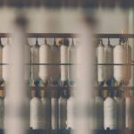 White textile on wooden rack — LCA digital product passport environmental data for fashion