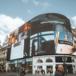 Digital billboards representing how a DPP can be used as a marketing tool for fashion brands