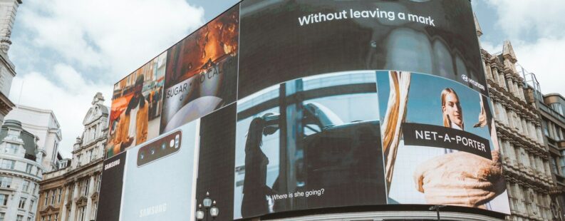 Digital billboards representing how a DPP can be used as a marketing tool for fashion brands